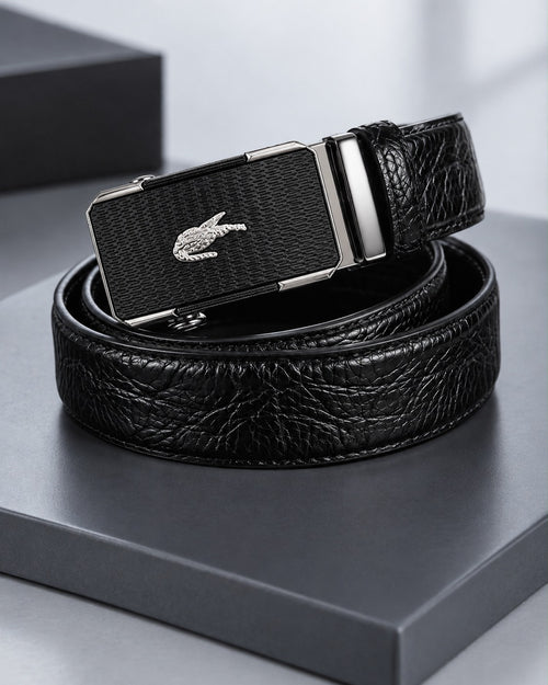 Black men's belt with crocodile-inspired textured strap and patterned silver-tone automatic-style buckle